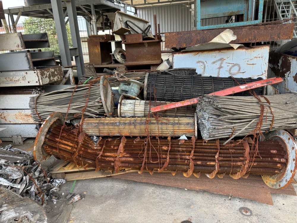 Heat exchanger tube bundles and condenser cores stacked at the Ogoo Recycle yard